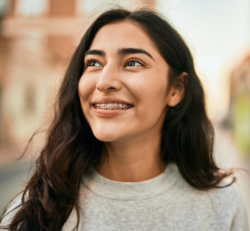 Woman smiling with braces