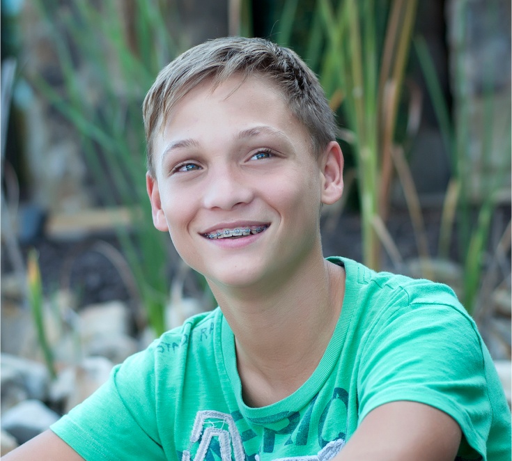 boy smiling with braces
